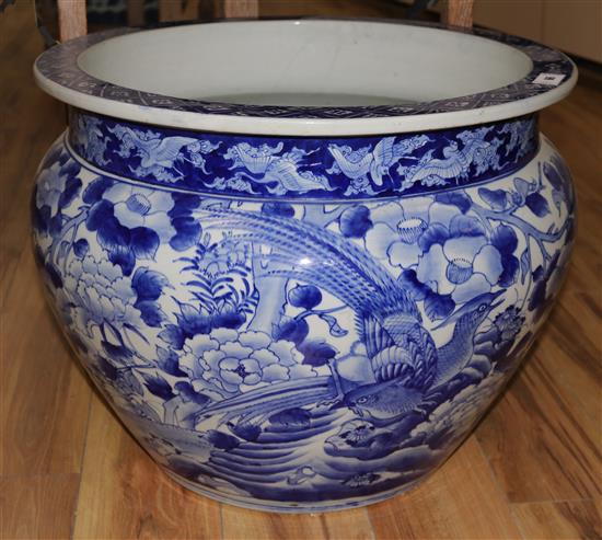 A large Japanese Arita blue and white jardiniere, diameter 60cms